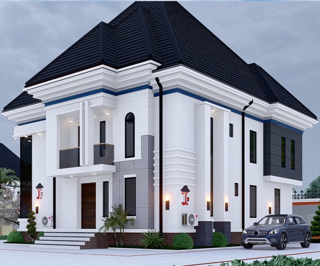 White residence with a dark pitched roof